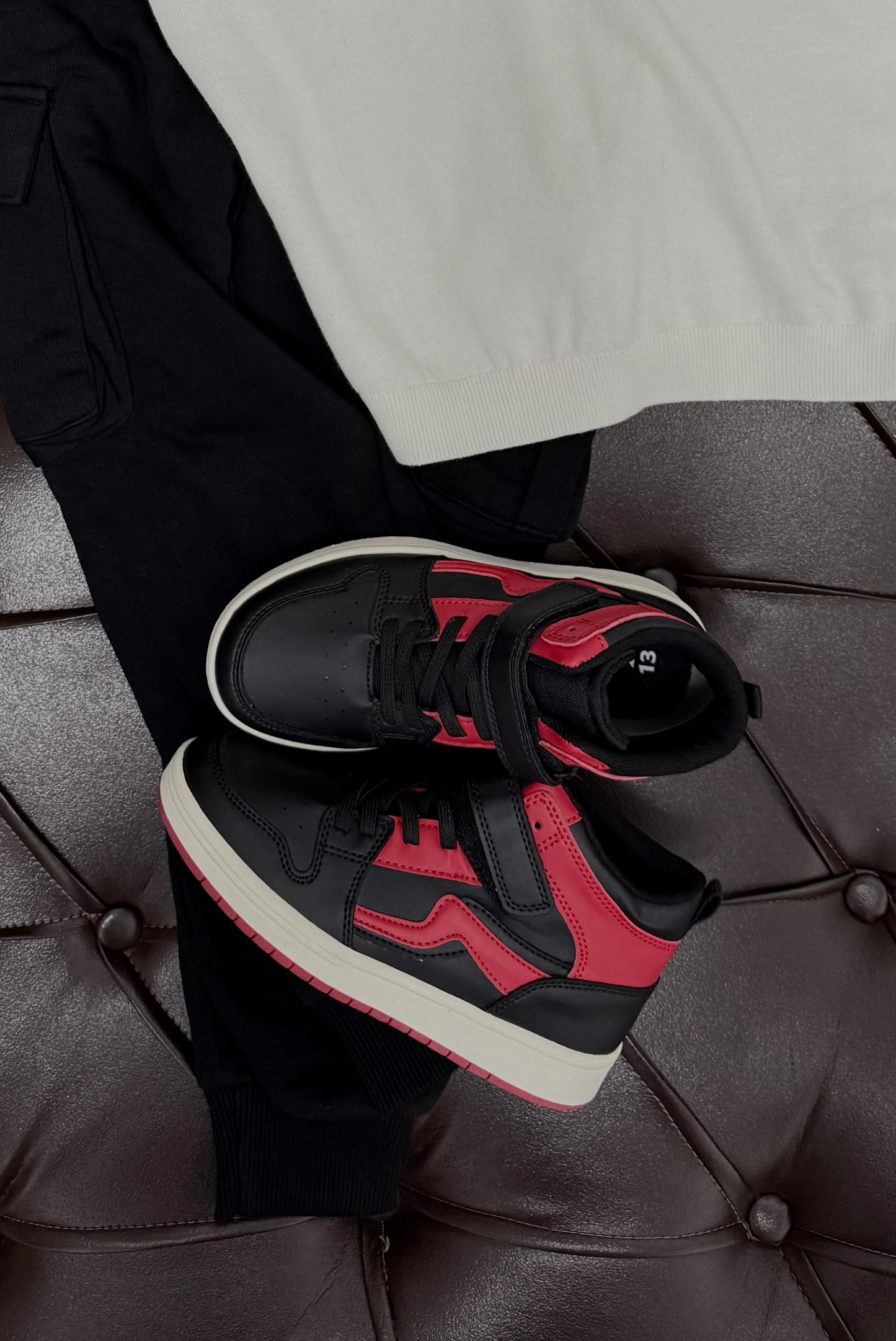 Next Navy & White Stripe Polo × Black Joggers × Black & Next Red Sneakers