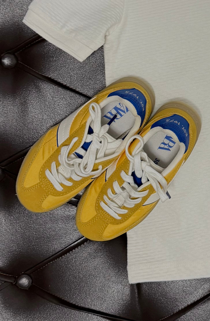 Ribbed Cream Tee + Mustard Shorts + Zara Yellow/Blue Sneakers